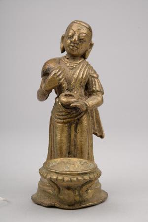 136896, oil lamp with donor figure