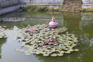 Waterpond with lotus flowers at Pindeshwor temple