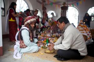 The official ritual specialist or shaman of the Kirat Rai Yayokkha in conversation during sakela puja