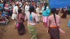Chamling Rai dance group from Nuntala village performing sakela sili dance steps at Tuwachung-Jayajum festival with watching crowd in the background
