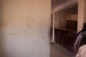 Office at Diktel authorities with marks of ink on the wall from citizens that cleaned their fingers after having given their fingerprints in official documents