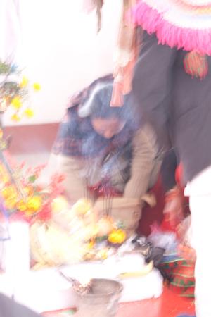 Sunuwar participants placing offerings for the sakela puja at Hattiban temple