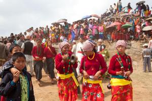 Participant of the Tuwachung-Jayajum festival watching the dance goups