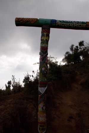 Woodcarving of the gate located at the Eastern path leading up to Tuwachung-Jayajum hill ridge