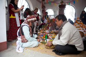 The official ritual specialist or shaman of the Kirat Rai Yayokkha in conversation during sakela puja