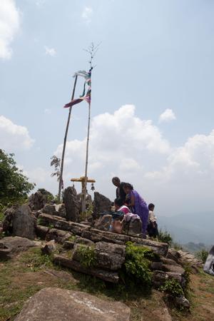 People giving offerings at the place of worship for Khema at Tuwachung-Jayajum festival