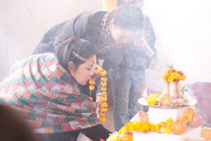 Limbu participants placing offerings for the sakela puja at Hattiban temple