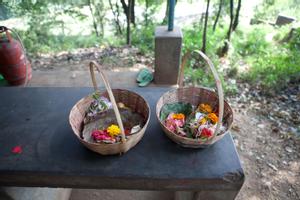 Baskets with flower offerings at Buddha Subbha temple in Dharan