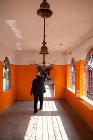 Hallway with bells in Pindeshwor temple