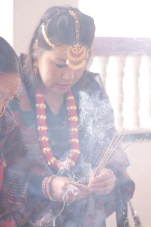 Limbu participants placing offerings for the sakela puja at Hattiban temple